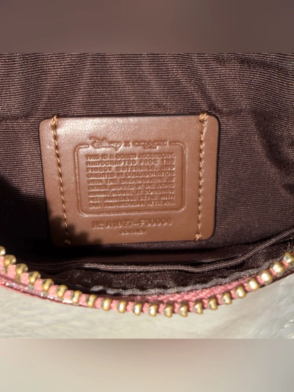 Disney x Coach Minnie Mouse Wristlet - Vintage Pink